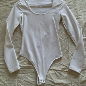 Abercrombie & Fitch White Long Sleeved Bodysuit, Size XS.